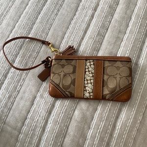 Coach wristlet - tan and brown - like new